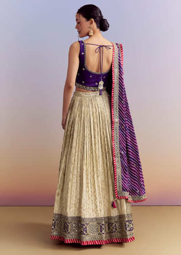 Purple Brocade Silk Bridesmaid Lehenga With Leheriya Dupatta And Zardosi Work