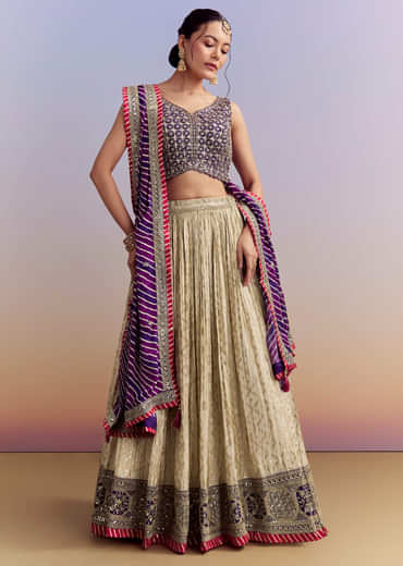 Purple Brocade Silk Bridesmaid Lehenga With Leheriya Dupatta And Zardosi Work