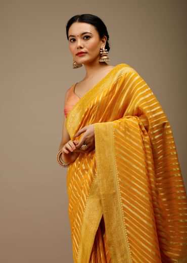 Radiant yellow georgette saree with brocade stripes