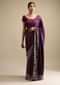 Raisin Purple Saree In Satin With Two Toned Kundan Embellished Border And Ready Stitched Blouse
