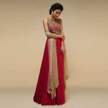 Rani Pink Anarkali Suit With Halter Neckline And Adorned In Multicolored Hand Embroidered Floral Design On The Bodice
