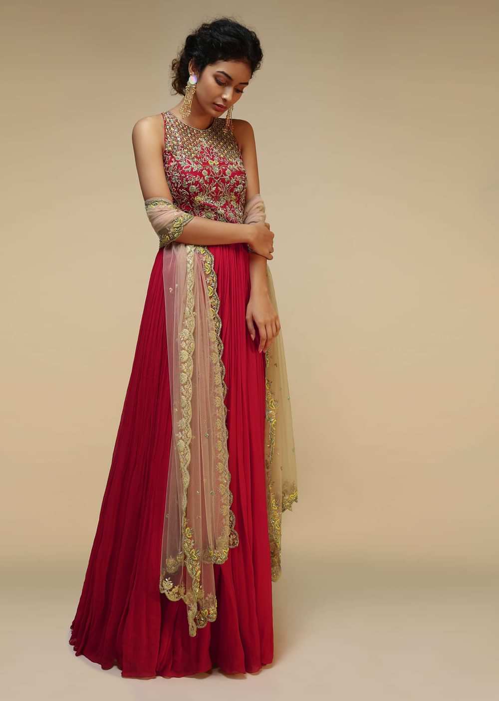 Rani Pink Anarkali Suit With Halter Neckline And Adorned In Multicolored Hand Embroidered Floral Design On The Bodice