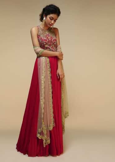 Rani Pink Anarkali Suit With Halter Neckline And Adorned In Multicolored Hand Embroidered Floral Design On The Bodice