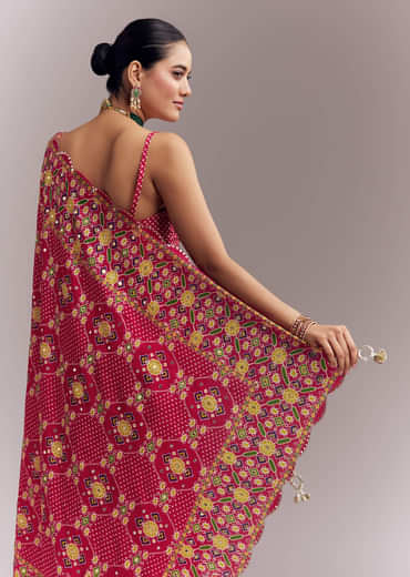 Rani Pink Satin Saree With Handwoven Ikat Print And Mirror Work