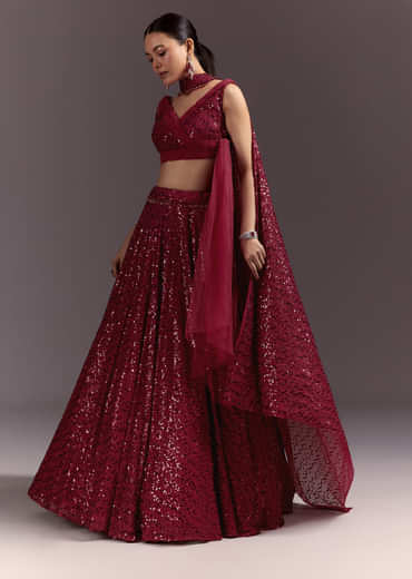 Red Lehenga Set With Embellished Dupatta And Tassels