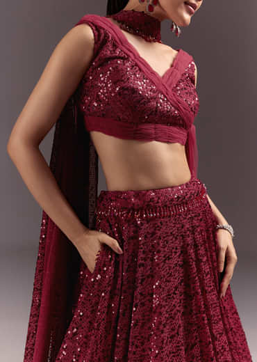 Red Lehenga Set With Embellished Dupatta And Tassels