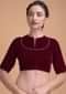 Red Blouse In Velvet With A Zari Lace Defining The Neckline