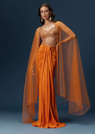 Rust Dhoti Skirt Set With Embellished Blouse And Tassel Net Dupatta