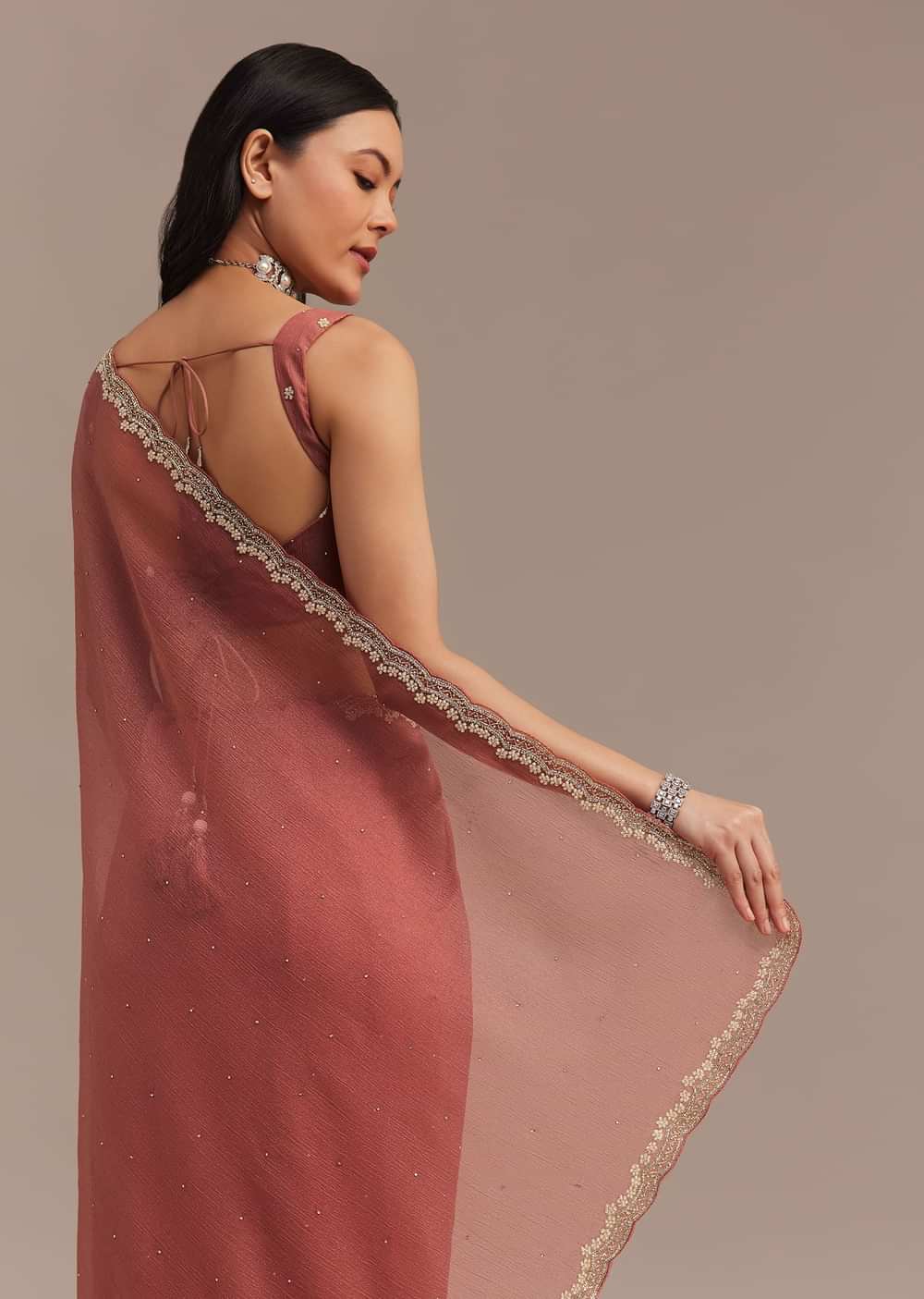 Rust Orange Crushed Tissue Saree With Stone And Cutdana Embellished Border