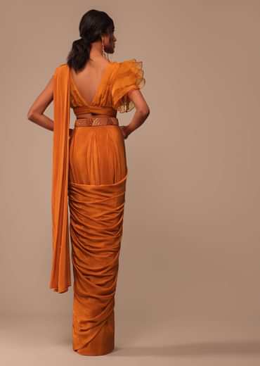 Rust Orange Saree With Fancy Ruffle Blouse And Embroidered Belt