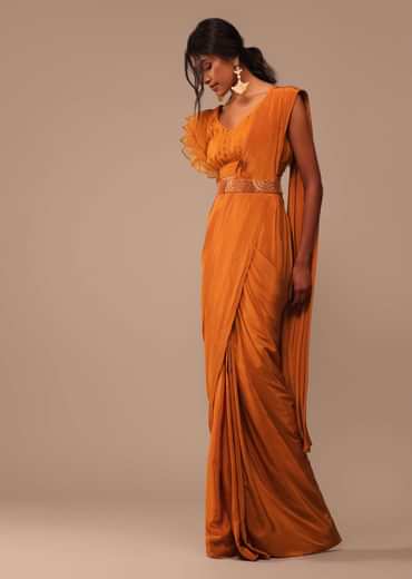 Rust Orange Saree With Fancy Ruffle Blouse And Embroidered Belt