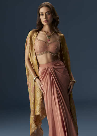 Rusty Pink Embroidered Blouse And Draped Skirt Set With Embellished Cape