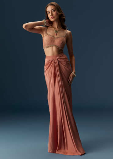 Rusty Pink Embroidered Blouse And Draped Skirt Set With Embellished Cape