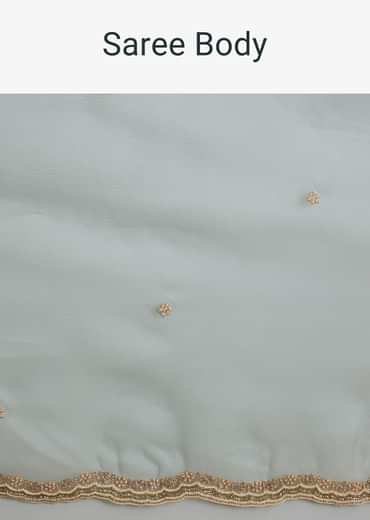 Sea Green Crush Tissue Saree With Stone And Moti Embroidery And Scallop Border