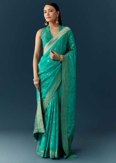 Sea Blue Dola Silk Saree with Woven Border and Unstitched Blouse