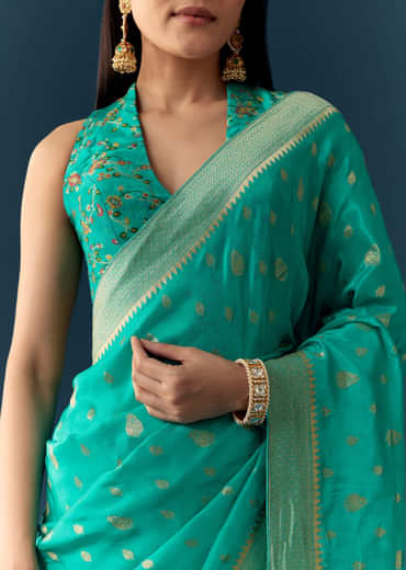 Sea Blue Dola Silk Saree with Woven Border and Unstitched Blouse