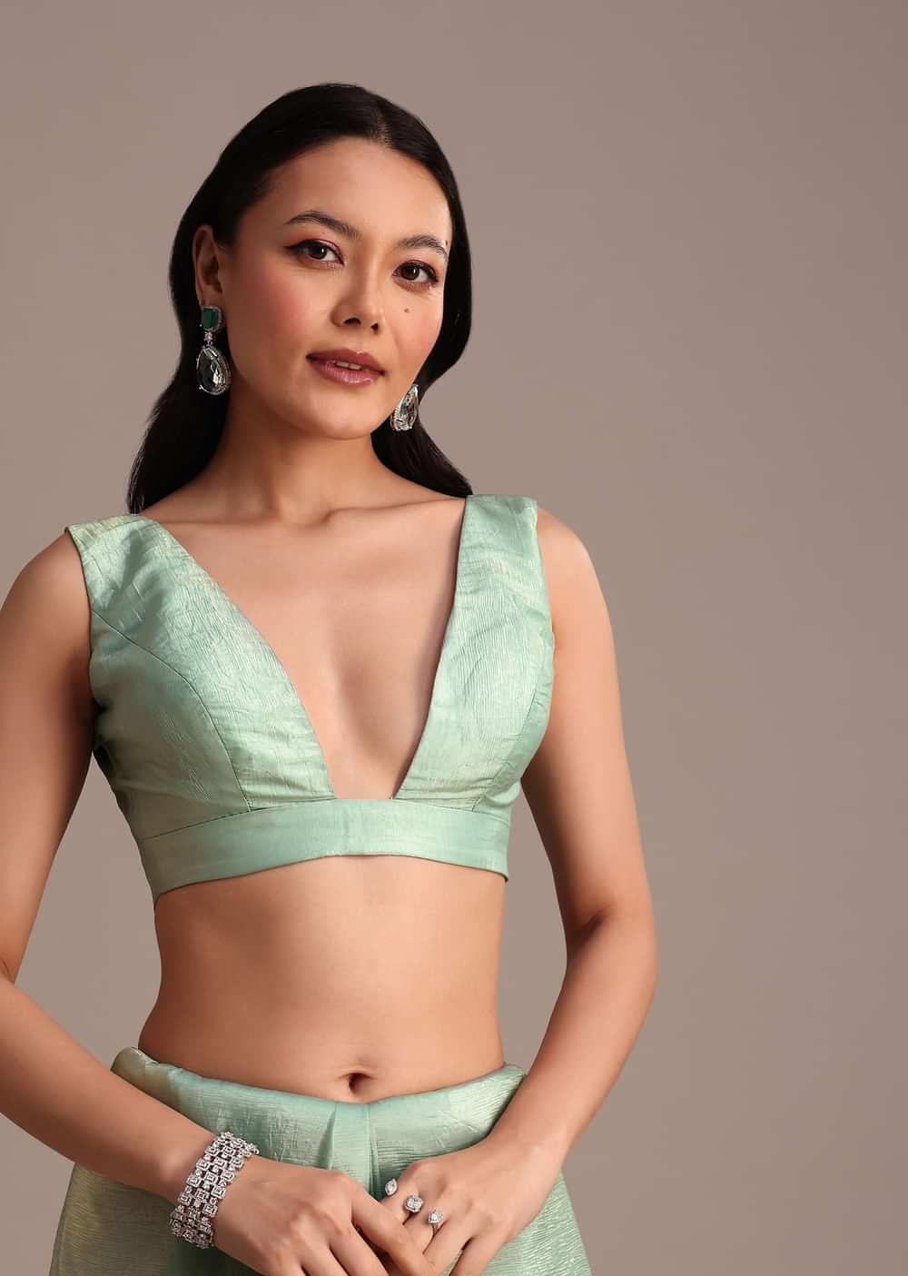 Sea Green Crushed Tissue Saree With Stone Embellished Border