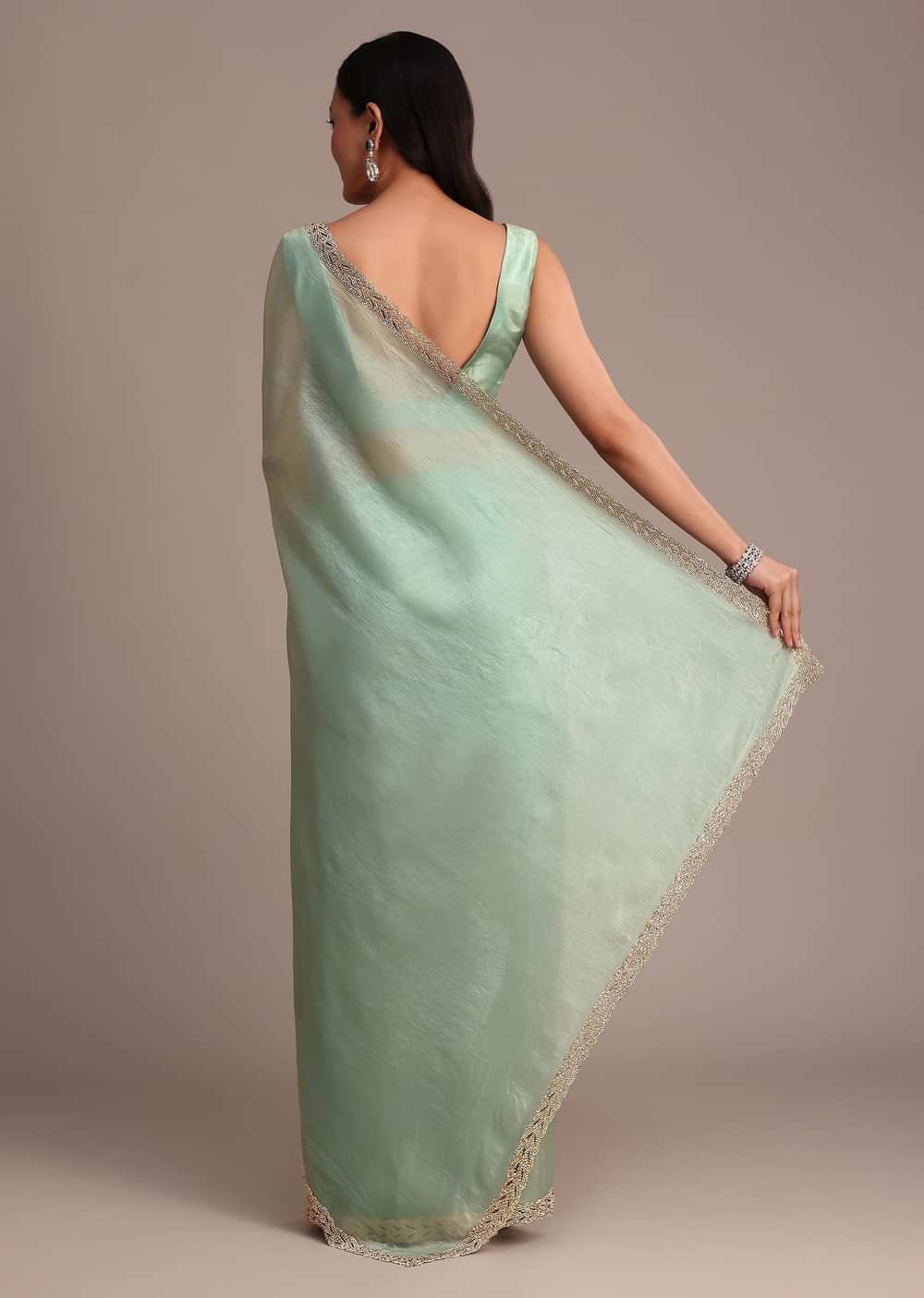 Sea Green Crushed Tissue Saree With Stone Embellished Border