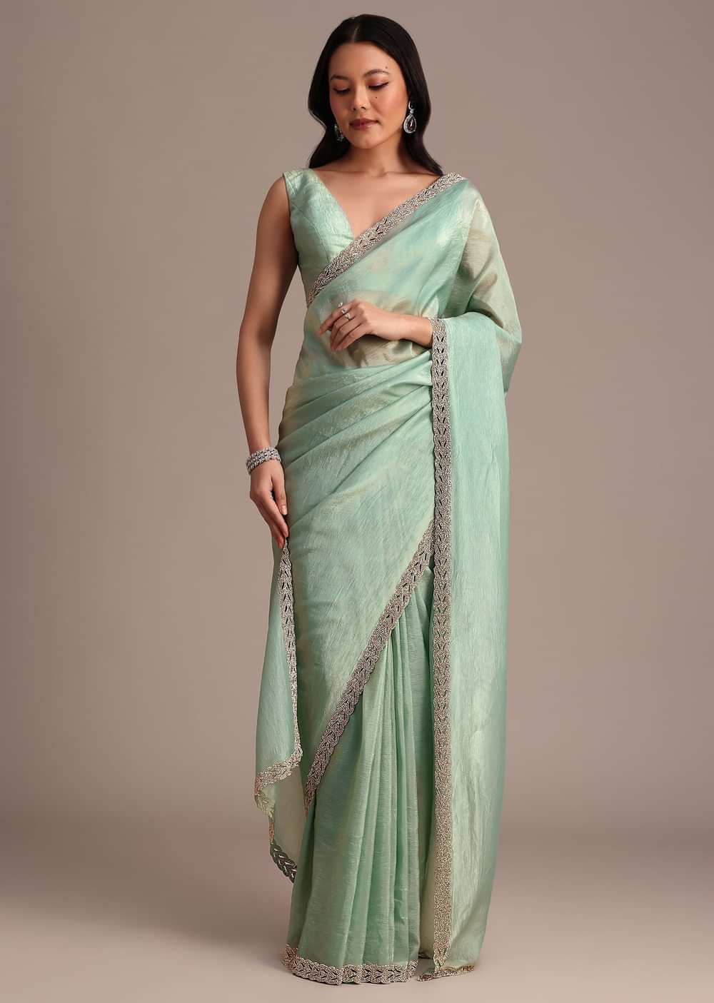 Sea Green Crushed Tissue Saree With Stone Embellished Border