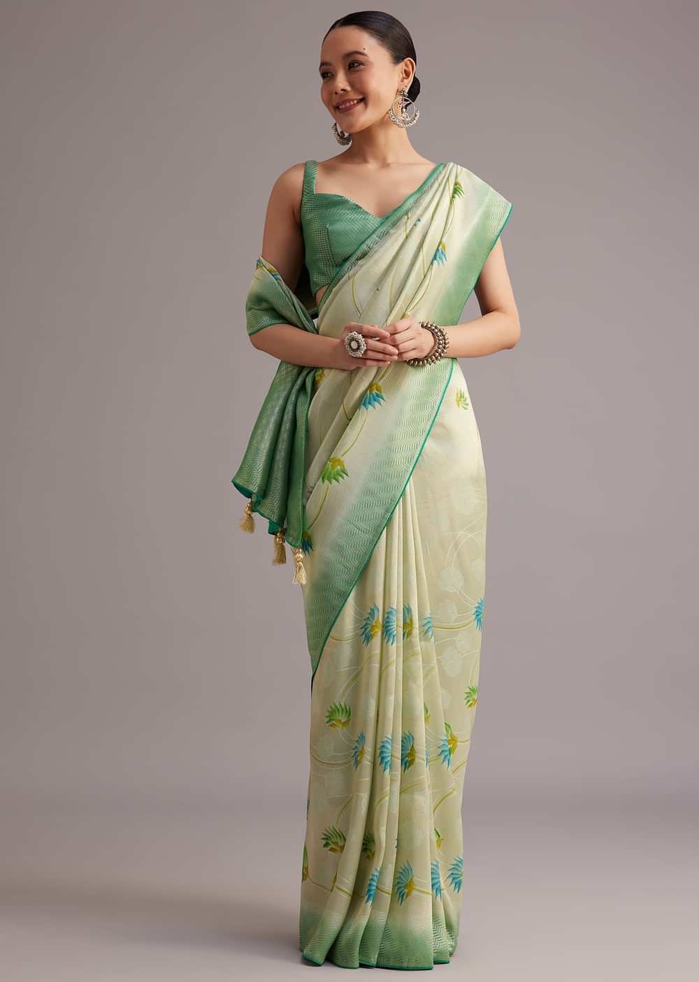 Sea Green Tissue Silk Floral Motif Saree With Contrast Pallu And Border