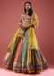 Multi Coloured Brocade Lehenga With Bandhani Print And Heavy Mirror Work On The Border