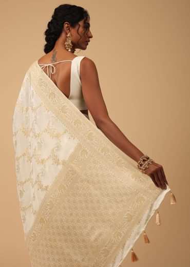 Ivory White Dola Silk Saree With Silver And Gold Jaal Embroidery In Floral Pattern