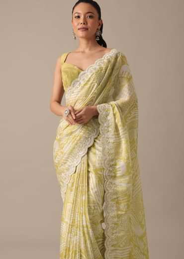 Yellow Printed Satin Saree With Embroidered Detail And Unstitched Blouse Piece