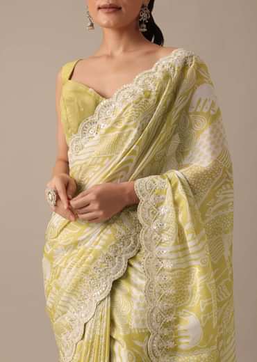 Yellow Printed Satin Saree With Embroidered Detail And Unstitched Blouse Piece