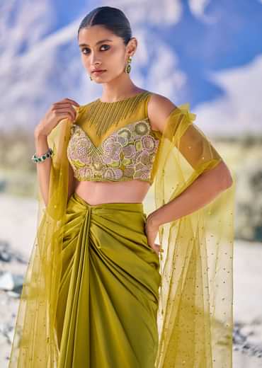 Green Satin Drape Skirt With Embroidered Blouse And Net Cape