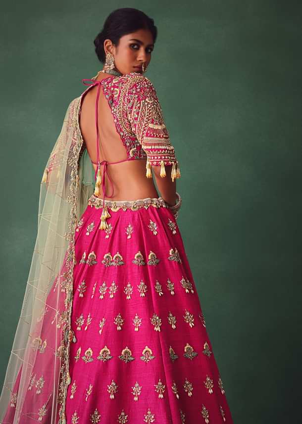 Deep Pink Bridal Butti Work Lehenga With Tassels on Blouse And Dupatta
