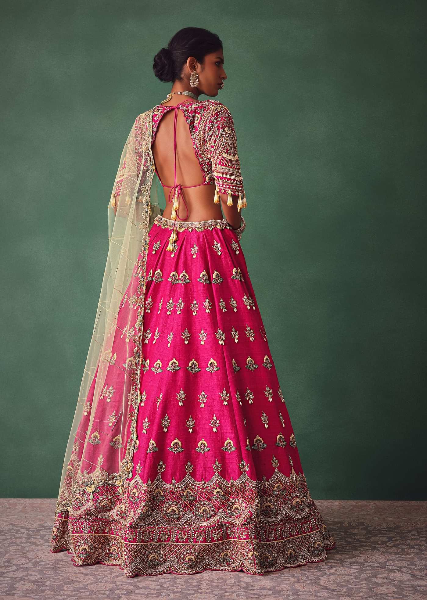Deep Pink Bridal Butti Work Lehenga With Tassels on Blouse And Dupatta