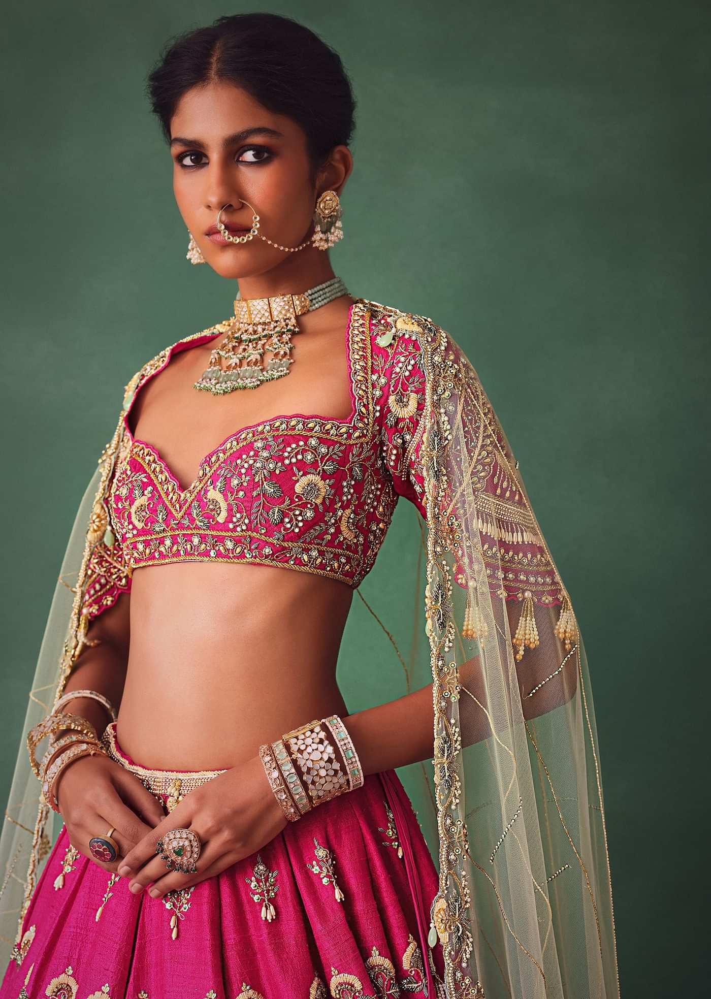 Deep Pink Bridal Butti Work Lehenga With Tassels on Blouse And Dupatta