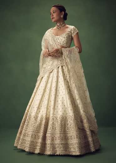 Ivory Lehenga Set With Hand Embroidered Thread And Zari Work