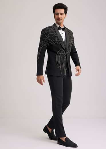 Black Suiting Tuxedo With Metallic Chain And Stone Work