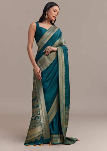 Peacock Blue Dola Silk Saree With All Over Zari Weaving