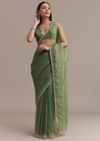 Green Organza Saree With Sequins And Cutdana Embellished Border