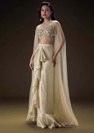 Beige Zardozi Embroidered Blouse With Brocade Drape Skirt And Net Cape