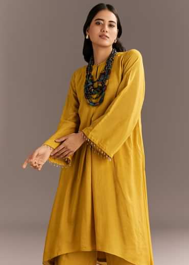 Mustard Yellow Solid Kurta Palazzo Set With Wooden Bib Neckpiece