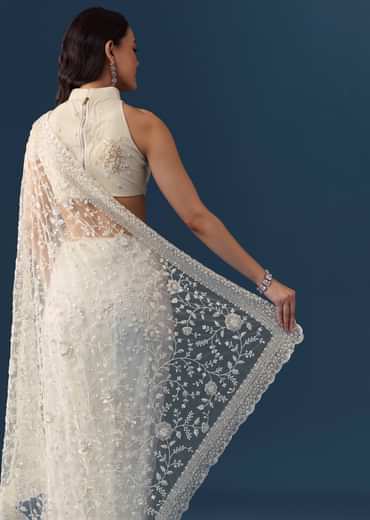 Cream Net Jaal Embellished Saree with Unstitched Blouse