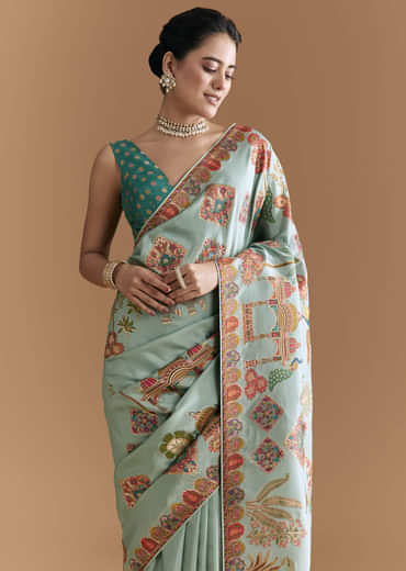 Sky Blue Dola Silk Saree With Madhubani Weave And Embroidery