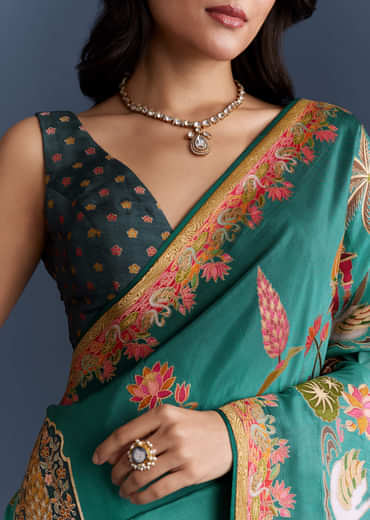 Teal Blue Dola Silk Saree With Nature Motifs And Embroidery