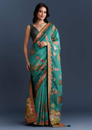 Teal Blue Dola Silk Saree With Nature Motifs And Embroidery