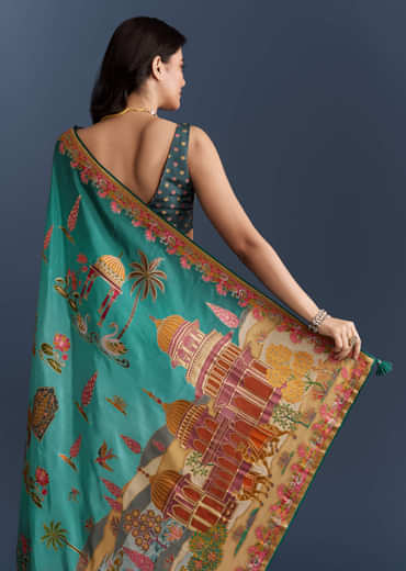 Teal Blue Dola Silk Saree With Nature Motifs And Embroidery