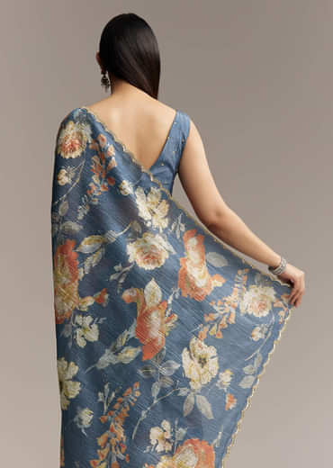 Teal Blue Tissue Saree With Floral Print And Embroidered Border