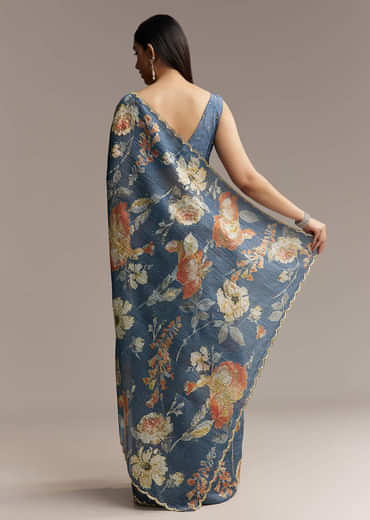 Teal Blue Tissue Saree With Floral Print And Embroidered Border