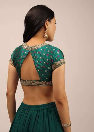 Teal Blouse In Brocade With Woven Buttis, Bandhani And Zardosi Embroidery