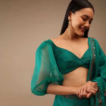 Teal Green Blouse In Raw Silk With Three Quarter Sleeves And Sweetheart Neckline