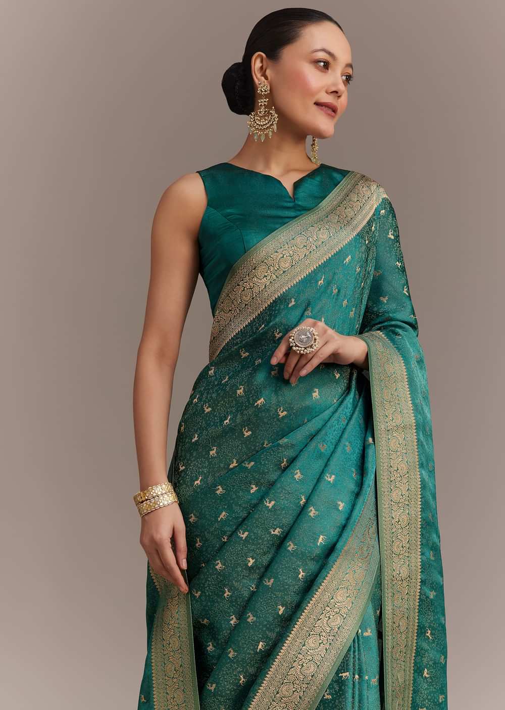 Teal Green Tissue Silk Saree With Zari Border Butti And Pallu