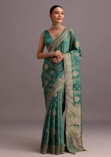 Teal Zari Work Satin Silk Woven Saree And Brocade Border