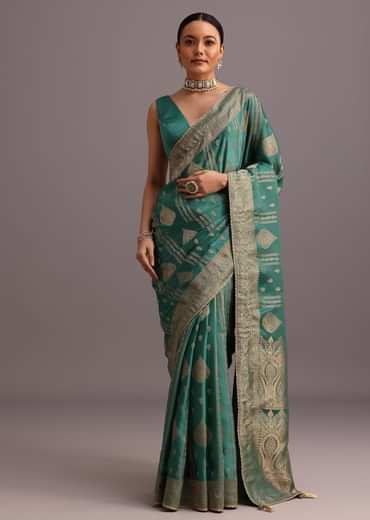 Teal Zari Work Satin Silk Woven Saree And Brocade Border